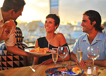Diners being served dinner