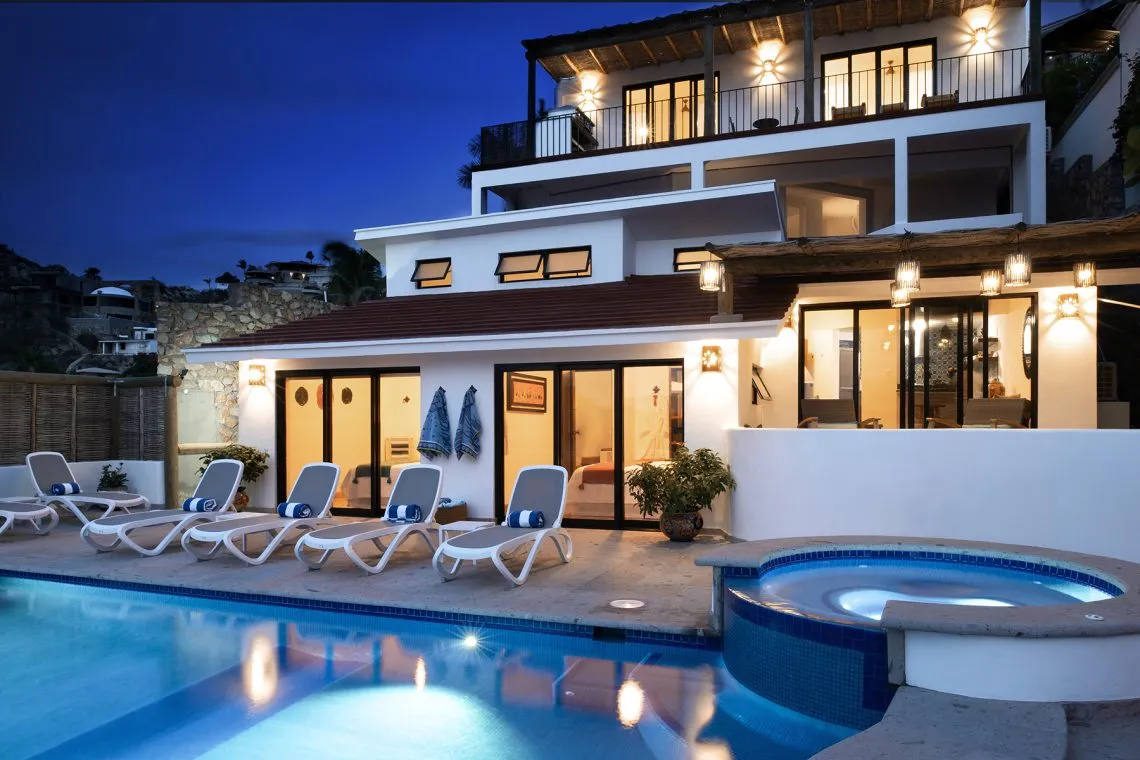 Evening at Villa Ysabel's poolside patio	